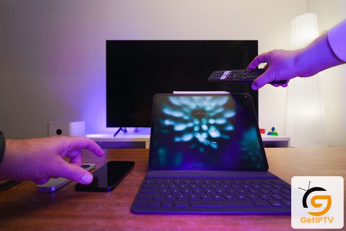 Photo of a smart TV in a living room with phone and remote control; GetIPTV logo added